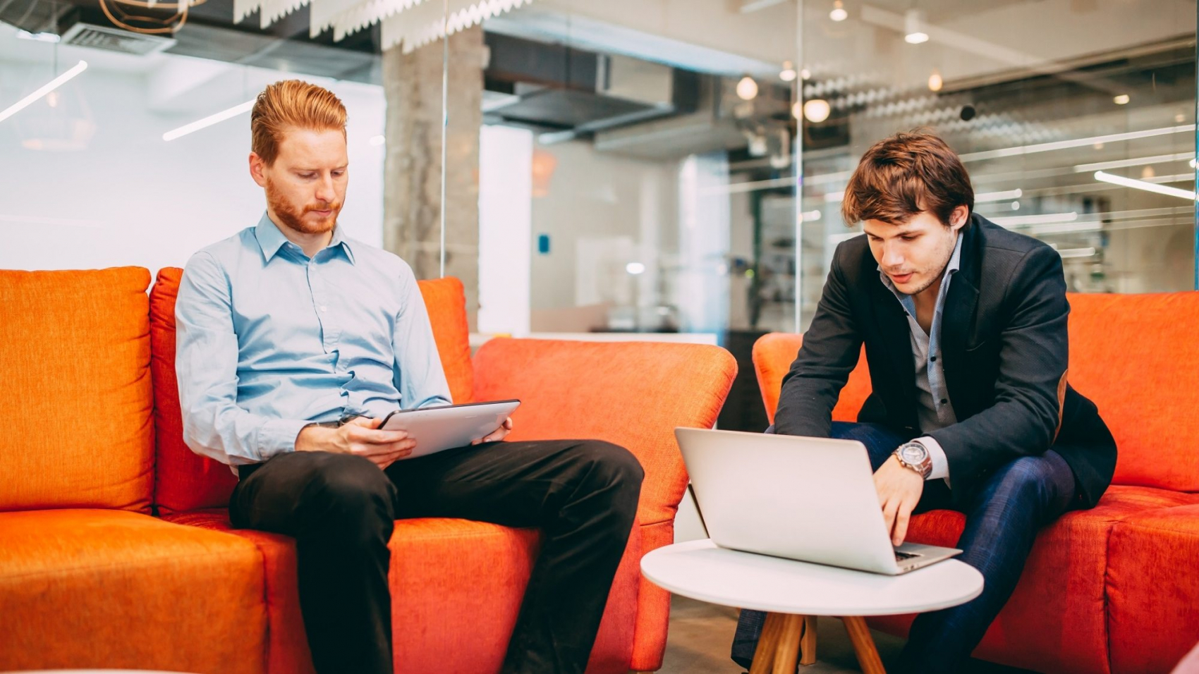 Business colleagues resting and talking during break