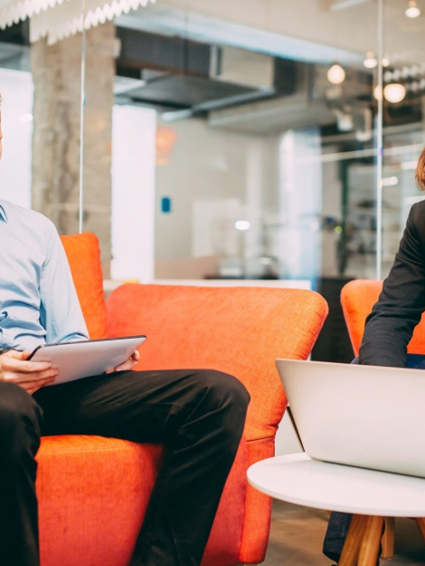 Business colleagues resting and talking during break